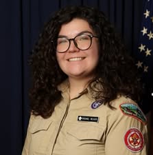 Rachel Weaver in scout uniform smiling